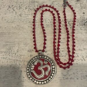 Handmade crochet necklace with Tibetan pendant